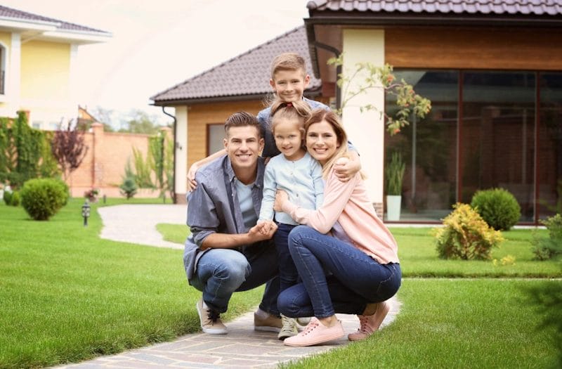 a happy family in their house